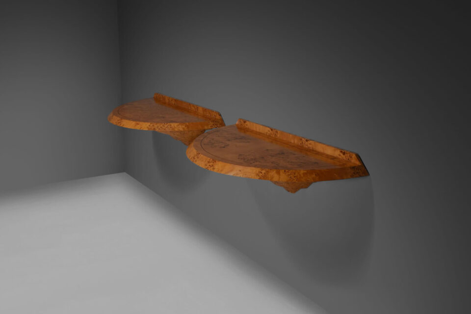 A refined pair of Art Deco wall-mounted consoles in beautifully figured burl wood.
