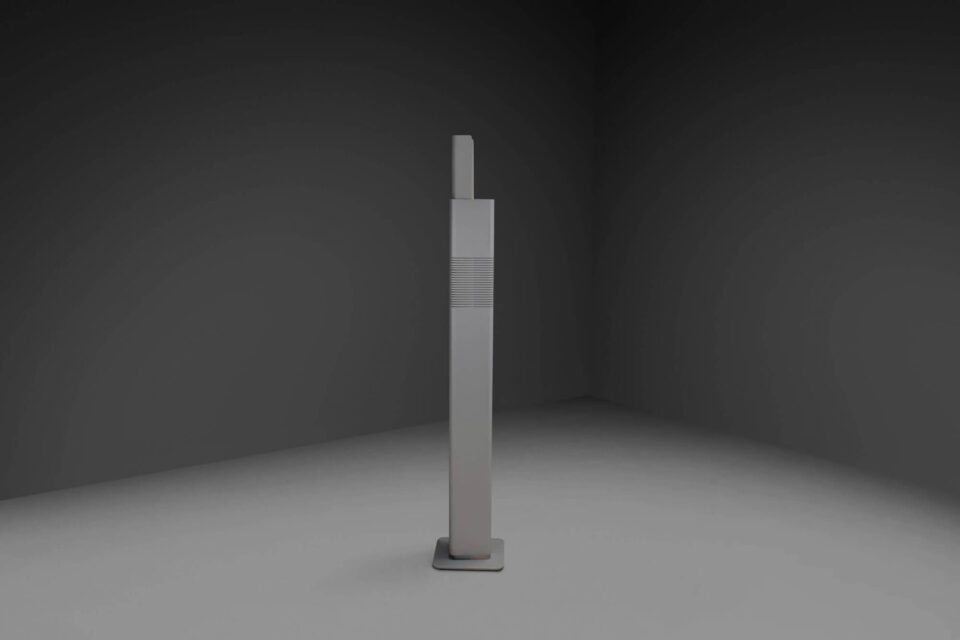 This sculptural floor lamp is entirely executed in grey lacquered anodized aluminium